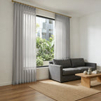 Sunlit modern lounge displaying the elegant drapery and texture of Gray Sheila Cotton Semi Sheer Curtains