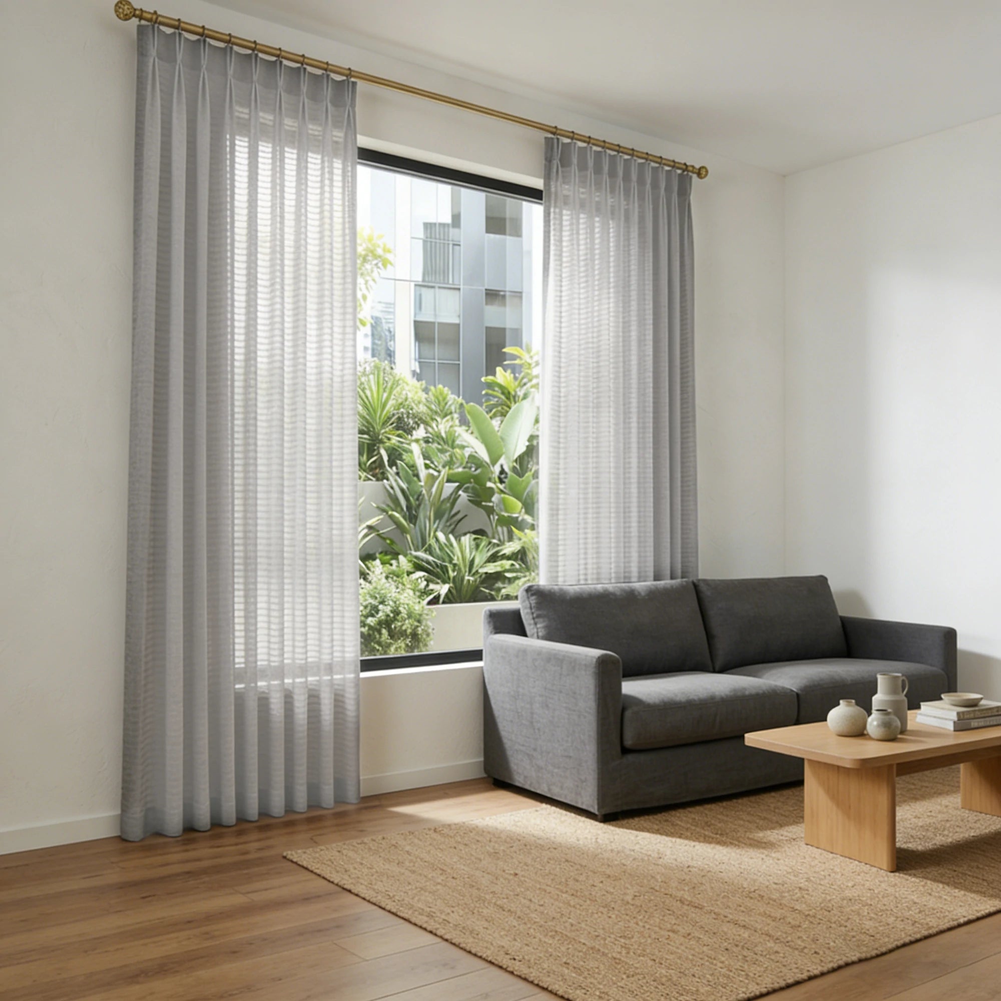 Sunlit modern lounge displaying the elegant drapery and texture of Gray Sheila Cotton Semi Sheer Curtains