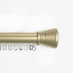 Tagore gold custom curtain rod with conical finials and flat track
