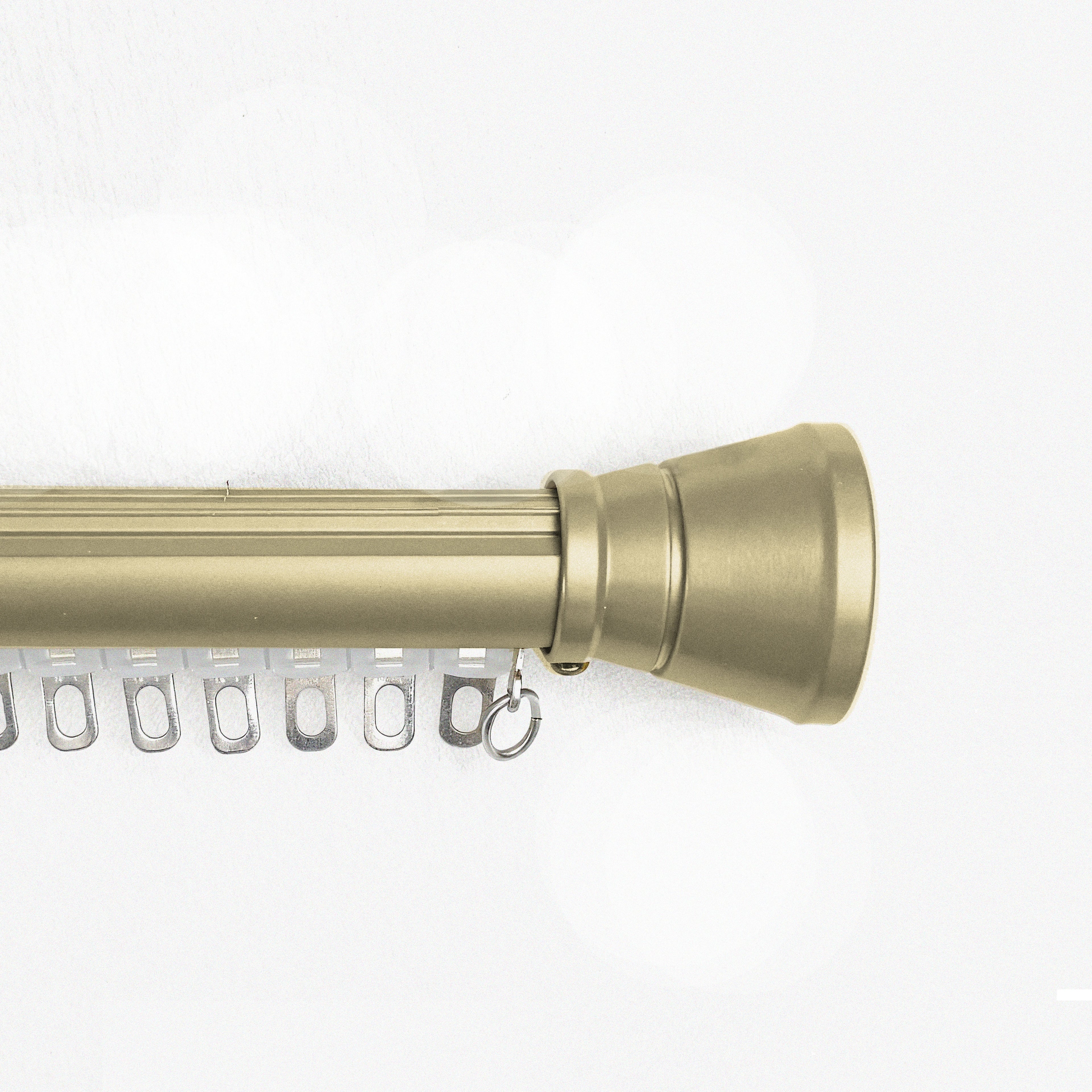 Tagore gold custom curtain rod with conical finials and flat track
