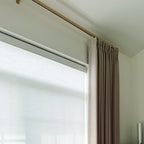 Luxury Gold Tagore Custom Traverse Rods styling with textured custom window treatments