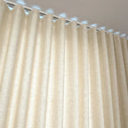 Partial view of custom-made curtain tracks
