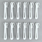 Detailed view of Zoe curtain hooks showing the hook mechanism with labels indicating 'Up' and 'Down' for height adjustment, set of 20.