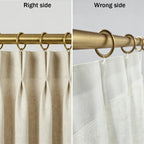 Multiple white plastic Zoe curtain hooks arranged on a gray background, demonstrating their size and design for window treatment accessories.