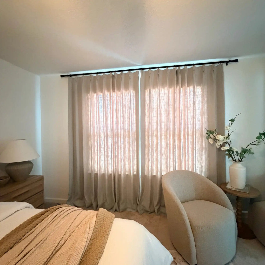 Light Brown John Linen Texture Cotton Curtains closed to filter sunlight in a minimalist neutral space