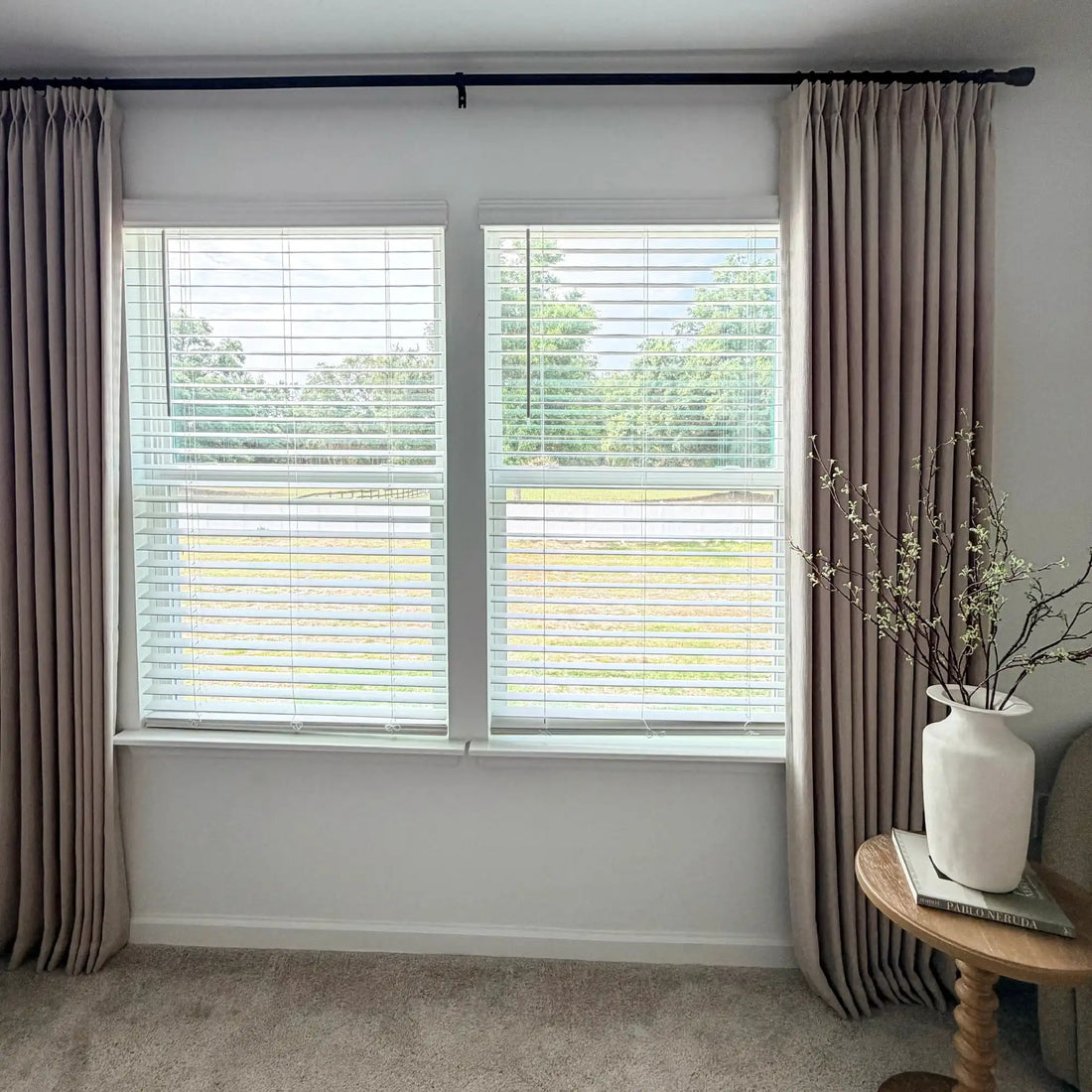 Light Brown John Linen Texture Cotton Curtains styled around white blinds with a ceramic vase on a side table