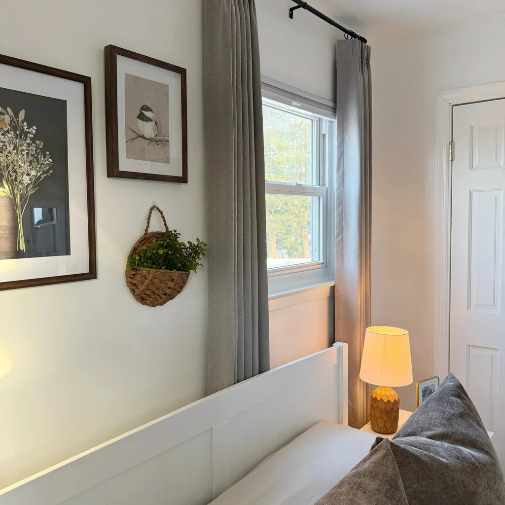 Premium quality Natural Beige Orion Linen Look Blackout Curtains creating a warm bedroom atmosphere