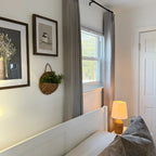 Premium quality Natural Beige Orion Linen Look Blackout Curtains creating a warm bedroom atmosphere