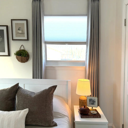 Bright bedroom decor featuring stylish Natural Beige Orion Linen Look Blackout Curtains by the window