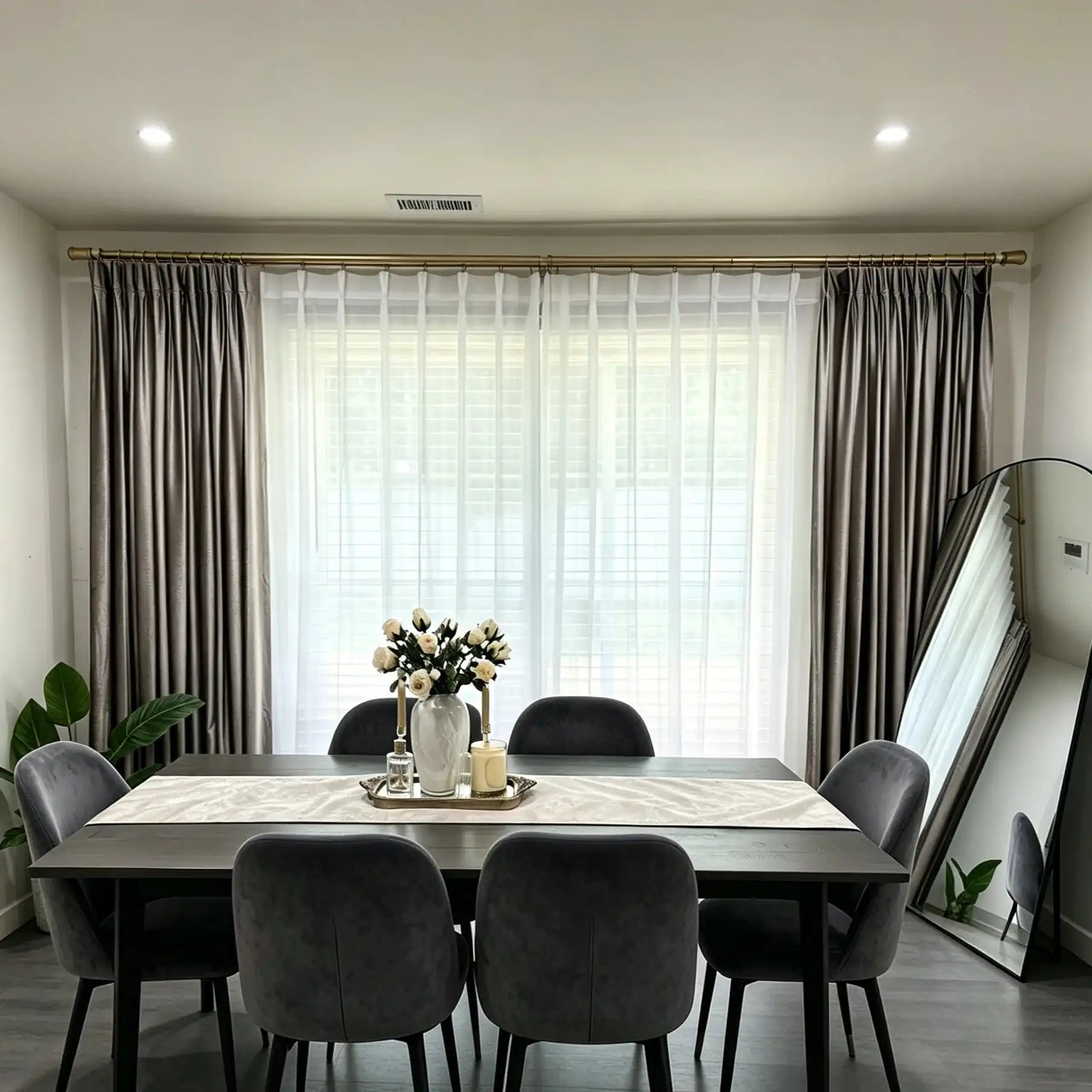 Pinch pleat White Lisa Semi Sheer Curtains paired with luxury drapes in a sophisticated dining room setup