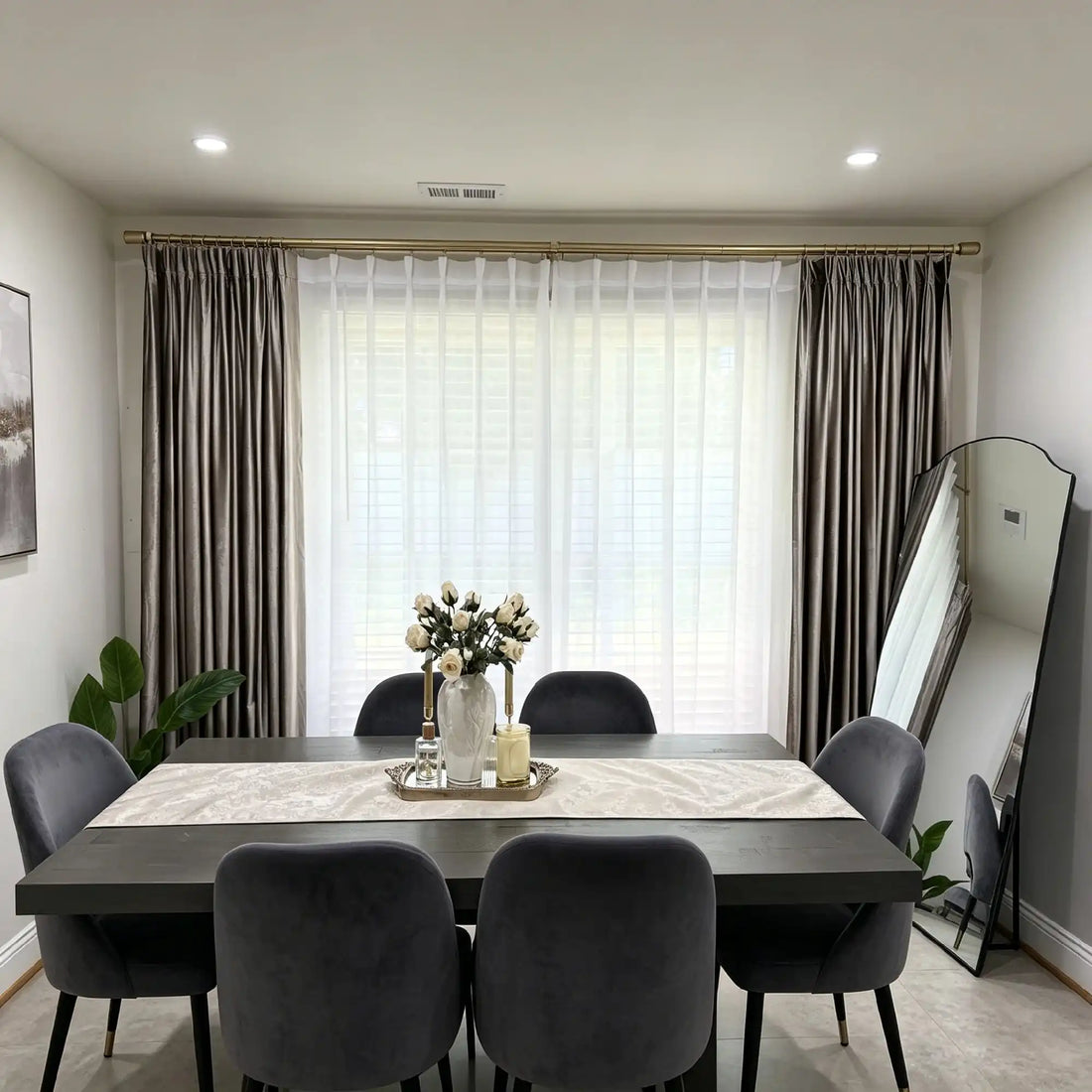 Beautifully pleated White Lisa Semi Sheer Curtains filtering soft light behind an elegant dinner table setup