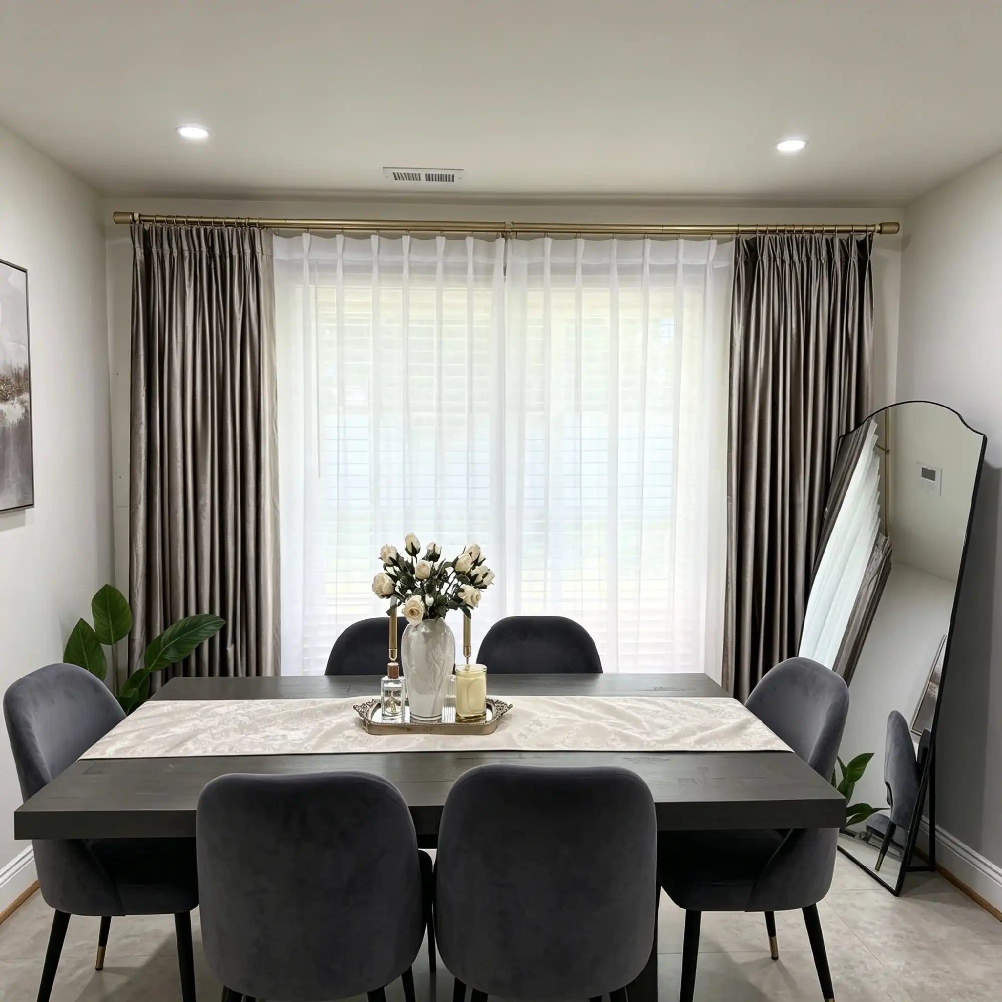 Beautifully pleated White Lisa Semi Sheer Curtains filtering soft light behind an elegant dinner table setup