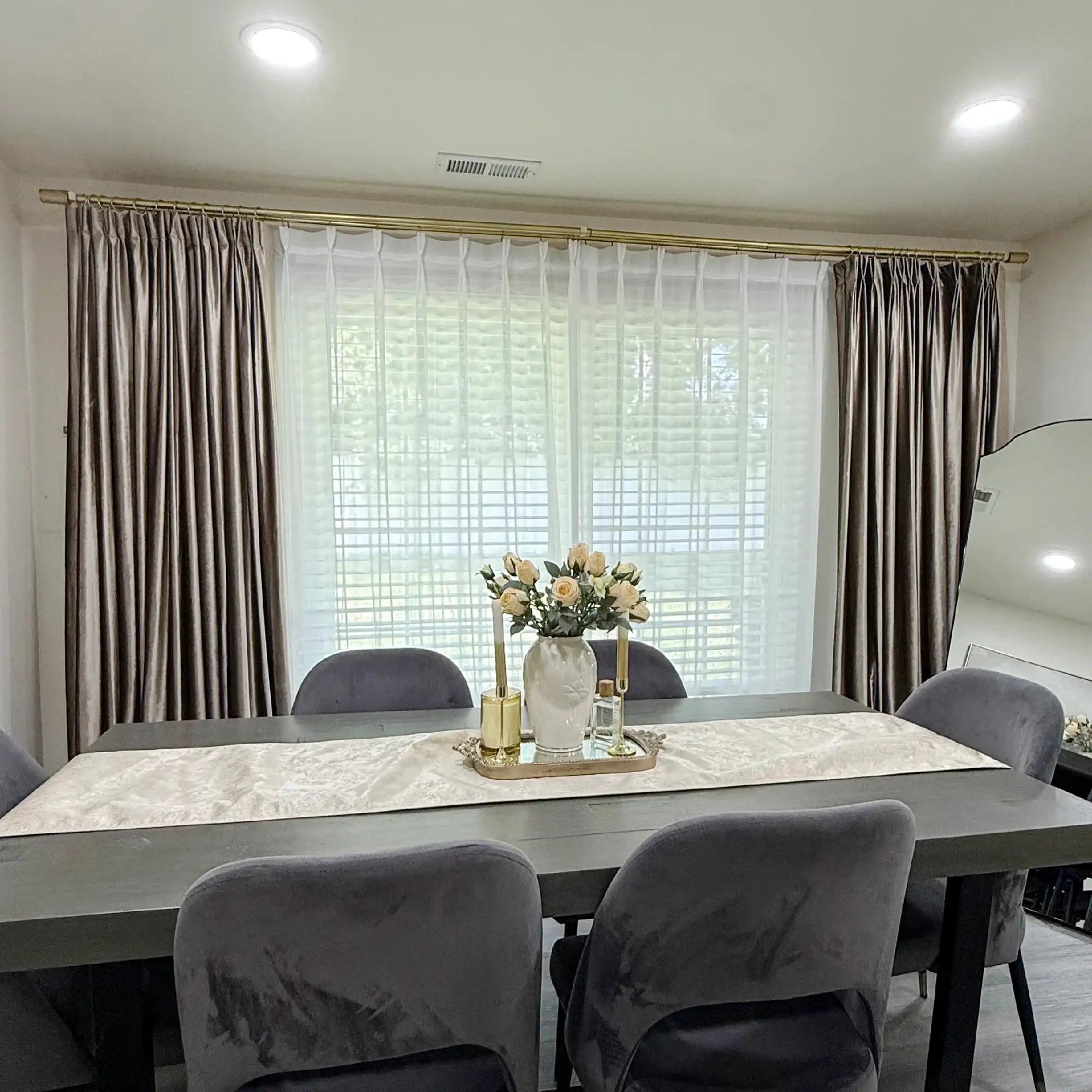 Tailored White Lisa Semi Sheer Curtains providing private yet luminous window coverage for a dining room