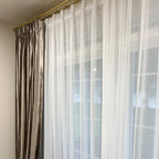 Close up showing the flawless drapery and elegant folds of White Lisa Semi Sheer Curtains
