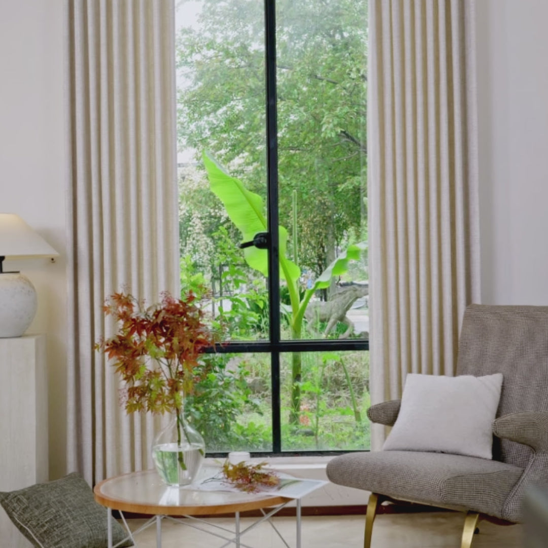 Dale Dimensional Cotton-Linen Textured Curtains in Light Yellow add a refined touch of quiet luxury to your home with their premium weave and crisp tailored pleats.