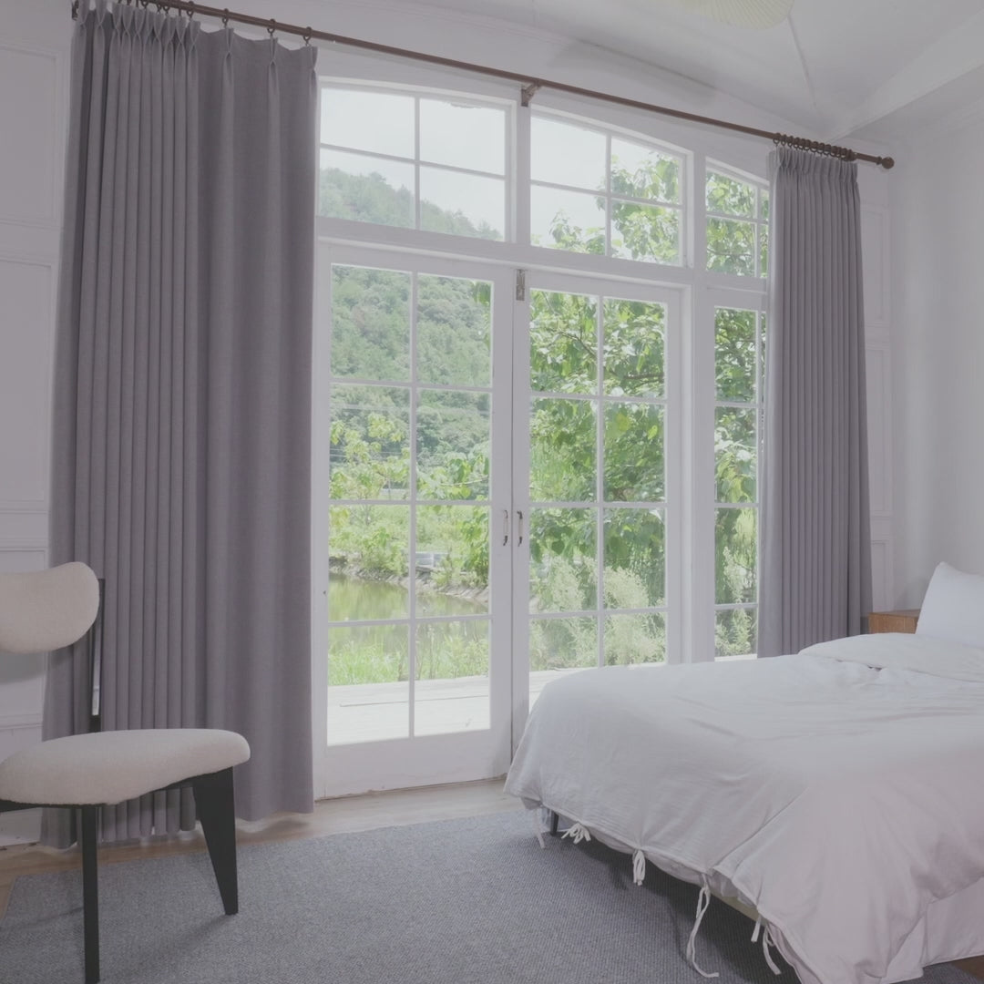 How to hang Light Gray Orion Linen Look 100 percent Blackout Curtains with pinch pleat hooks on a wooden rod