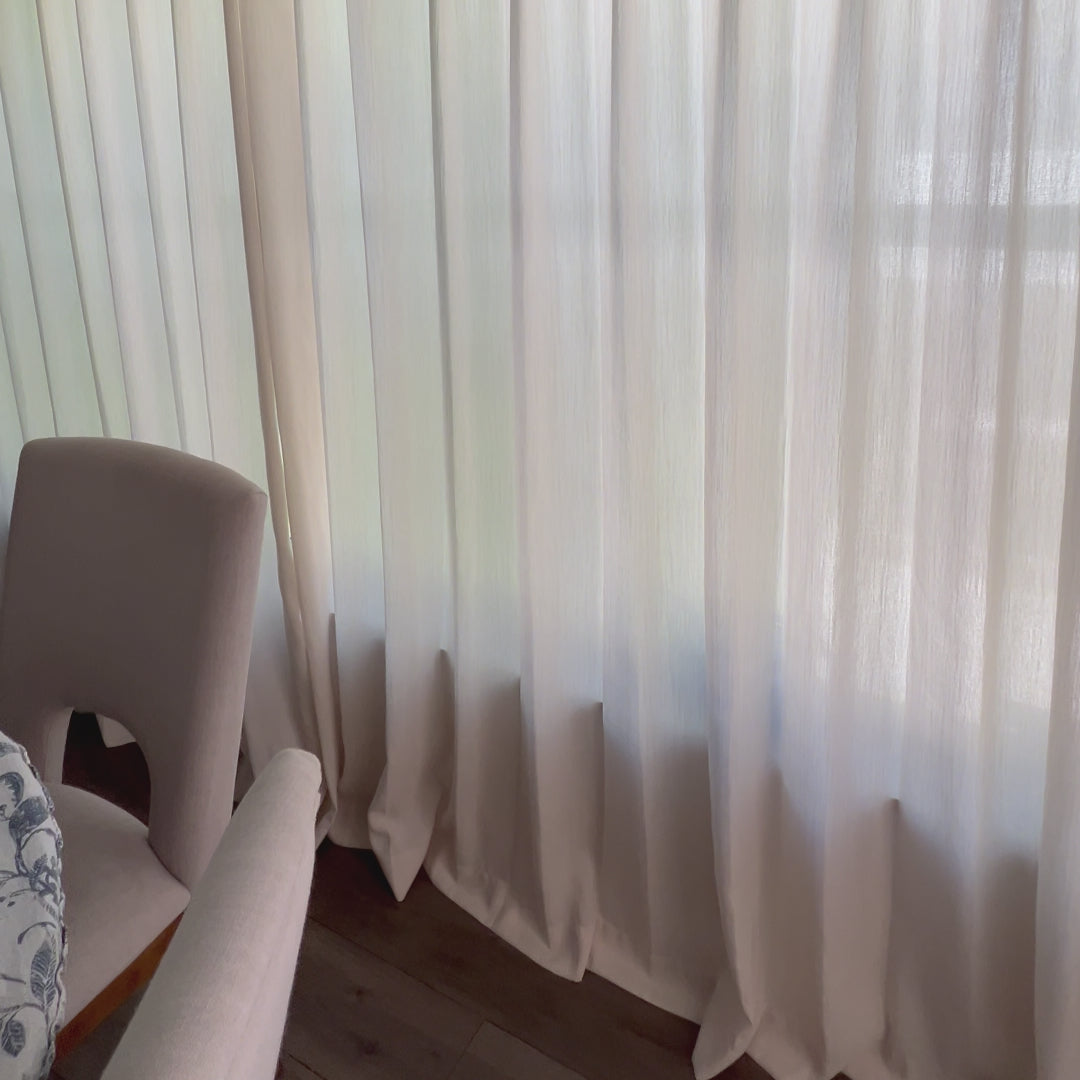 Elegant Ripple Fold Beige Sarah Semi Sheer Curtains styled in a modern dining room featuring a delicate woven texture that filters soft sunlight while maintaining daytime privacy